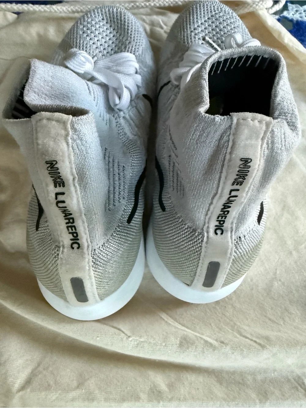 Nike Women’s Lunarepic White and Black Flyknit running Sneakers